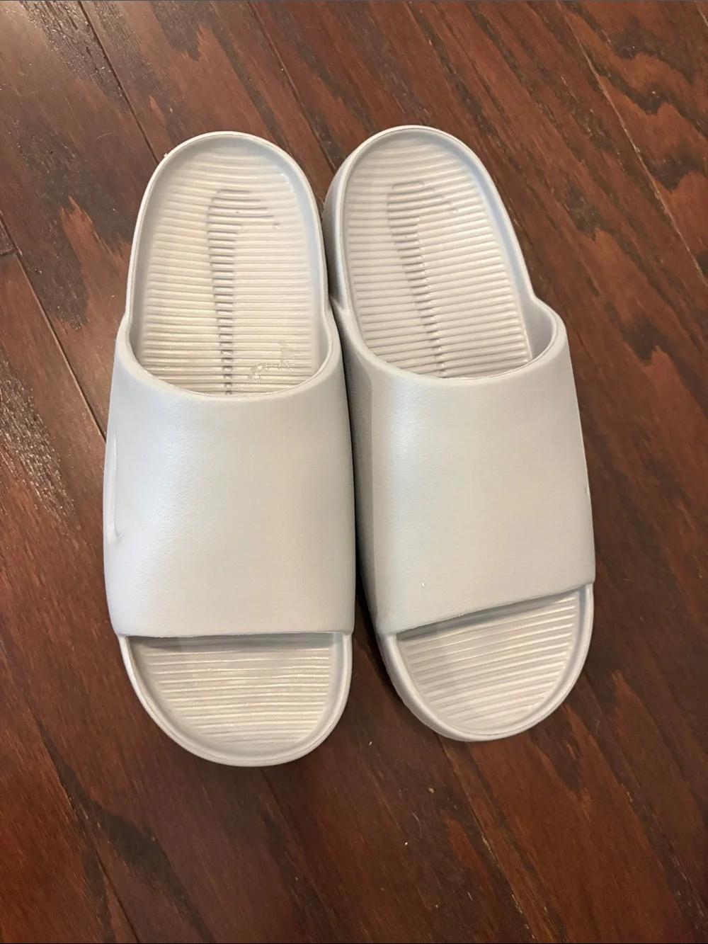 Nike White Slide Sandals with Subtle Swoosh